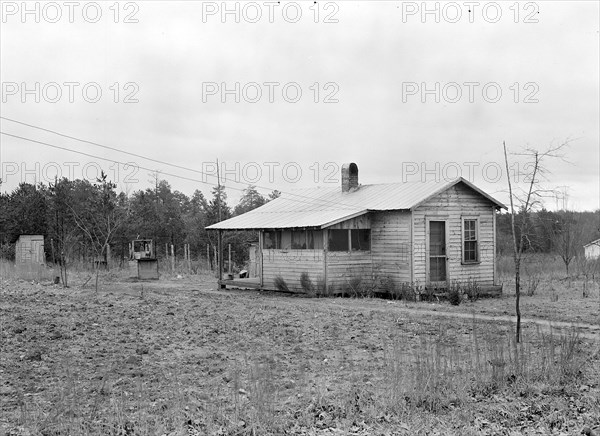 High Point, North Carolina - Housing. Homes of skilled furniture workers in Tomlinson Chair Mfg. Company, High Point, North Carolina. They have bought a small parcel of land, just outside the city limits, and put up a small cottage themselves. This seems to be popular, 1936, Lewis Hine, 1874 - 1940, was an American photographer, who used his camera as a tool for social reform. US,USA