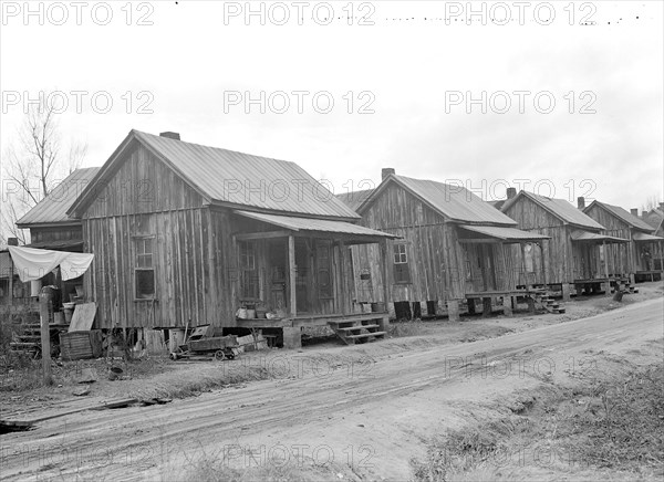 High Point, North Carolina - Housing. Row of hovels occupied by colored workers from furniture and cotton mills - High Point, North Carolina, 1936, Lewis Hine, 1874 - 1940, was an American photographer, who used his camera as a tool for social reform. US,USA