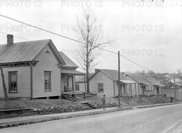 High Point, North Carolina - Housing. Row of company-owned homes of furniture workers - High Point, North Carolina, 1936, Lewis Hine, 1874 - 1940, was an American photographer, who used his camera as a tool for social reform. US,USA