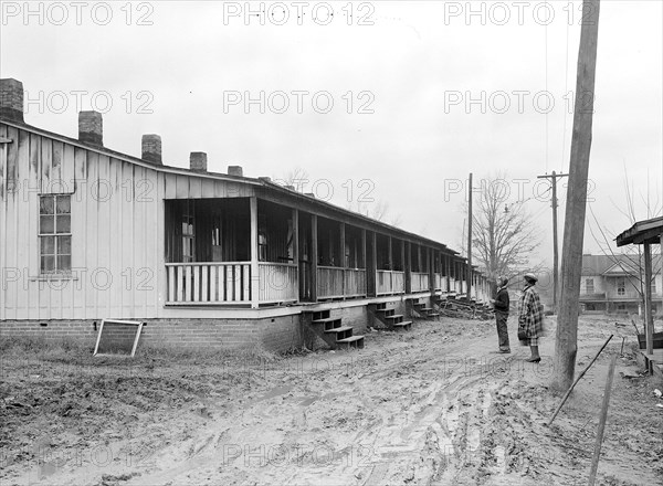 High Point, North Carolina - Housing. Row of shacks occupied by colored textile and furniture workers - High Point, North Carolina. Last Xmas a fire destroyed some of the homes but the others are still occupied, 1936, Lewis Hine, 1874 - 1940, was an American photographer, who used his camera as a tool for social reform. US,USA