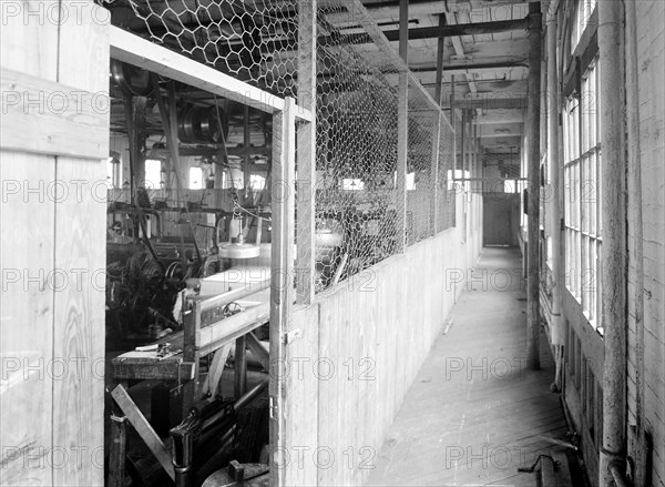 Paterson, New Jersey - Textiles. Showing the method of sub-dividing a large floor in a big mill so a number of so-called family-shops may be installed. Also called cockroach sop, 1936, Lewis Hine, 1874 - 1940, was an American photographer, who used his camera as a tool for social reform. US,USA