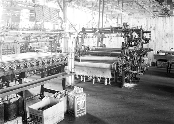 Paterson, New Jersey - Textiles. Idle quilling machines and looms in a cockroach shop, March 1937, Lewis Hine, 1874 - 1940, was an American photographer, who used his camera as a tool for social reform. US,USA