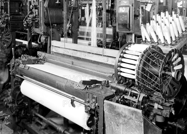 Paterson, New Jersey - Textiles. Looms, March 1937, Lewis Hine, 1874 - 1940, was an American photographer, who used his camera as a tool for social reform. US,USA