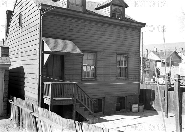 Paterson, New Jersey - Textiles. Home of silk workers in rear (inner) court off Sealey St. (very poor interior), March 1937, Lewis Hine, 1874 - 1940, was an American photographer, who used his camera as a tool for social reform. US,USA