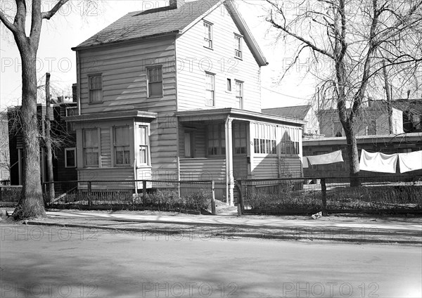 Paterson, New Jersey - Textiles. Home of Salvatore De Crasenso, 583 E. 231 St. Owner of small family shop of 8 or 10 looms, March 1937, Lewis Hine, 1874 - 1940, was an American photographer, who used his camera as a tool for social reform. US,USA