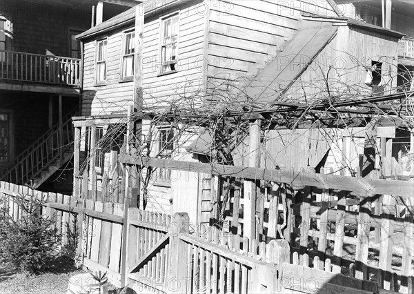 Paterson, New Jersey - Textiles. Rear tenement off Summer St. Former silk workers, March 1937, Lewis Hine, 1874 - 1940, was an American photographer, who used his camera as a tool for social reform. US,USA