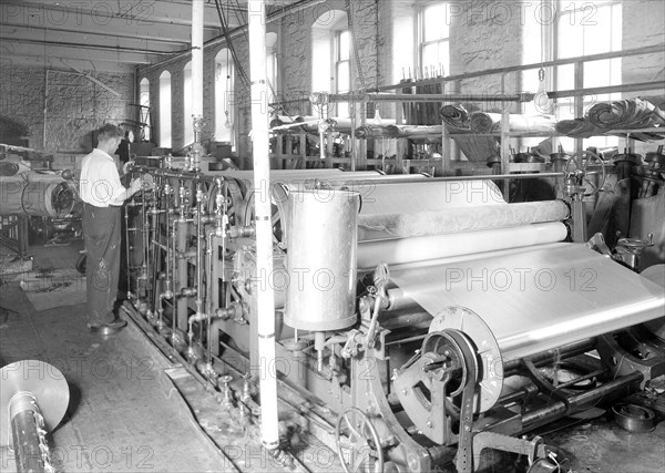 Paterson, New Jersey - Textiles. [Man working at machines.], 1936, Lewis Hine, 1874 - 1940, was an American photographer, who used his camera as a tool for social reform. US,USA