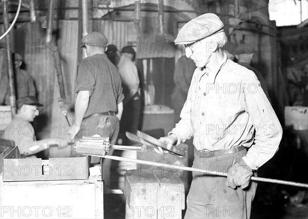 Millville, New Jersey - Glass bottles. [Man at work.], 1936, Lewis Hine, 1874 - 1940, was an American photographer, who used his camera as a tool for social reform. US,USA