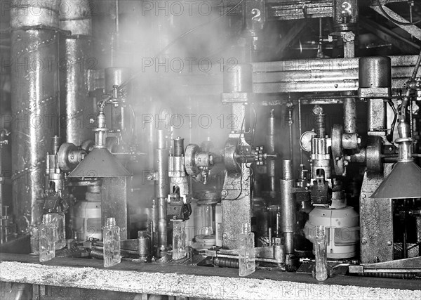 Millville, New Jersey - Glass bottles. [Machiney and bottles.], 1936, Lewis Hine, 1874 - 1940, was an American photographer, who used his camera as a tool for social reform. US,USA