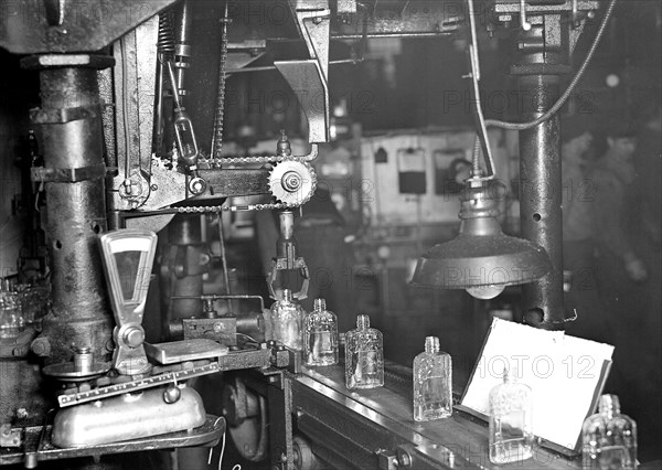 Millville, New Jersey - Glass bottles. [Bottles moving along a conveyor belt.], 1936, Lewis Hine, 1874 - 1940, was an American photographer, who used his camera as a tool for social reform. US,USA