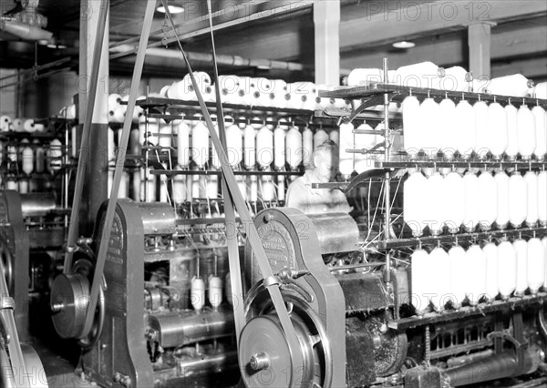 Millville, New Jersey - Textiles. Millville Manufacturing Co. [Man in between machines.], 1936, Lewis Hine, 1874 - 1940, was an American photographer, who used his camera as a tool for social reform. US,USA