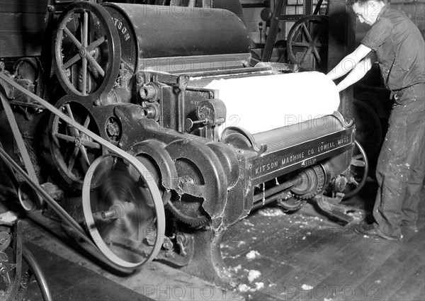 Millville, New Jersey - Textiles. Millville Manufacturing Co. [Man rolling fabric.], 1936, Lewis Hine, 1874 - 1940, was an American photographer, who used his camera as a tool for social reform. US,USA