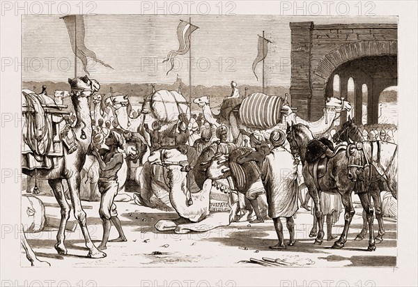 THE PRINCE OF WALES AT TRICHINOPOLY, 1876: THE RAILWAY STATION BEFORE THE PRINCE'S ARRIVAL: LOADING CAMELS WITH TROOPS' BAGGAGE