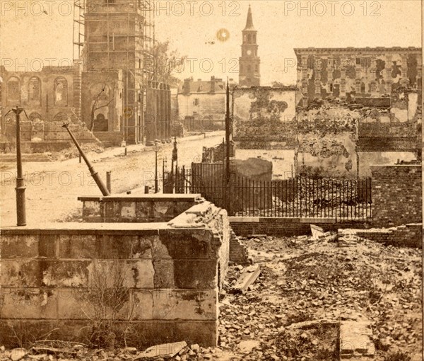 Meeting St., Charleston, S.C., looking South, showing the ruins of Circular church and the Mills House, St. Michael's church in the distance, USA, US, Vintage photography