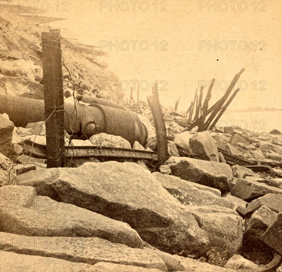 View of Fort Sumpter (i.e. Sumter), showing the debris, shot, shell, and broken guns. Fort Sumter is a Third System masonry sea fort located in Charleston Harbor, South Carolina. The fort is best known as the site upon which the shots that started the American Civil War were fired, at the Battle of Fort Sumter on April 12, 1861. , Vintage photography
