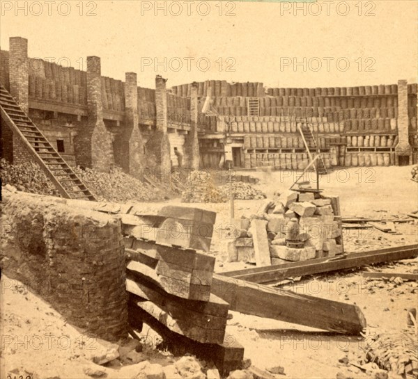 Interior of Fort Sumpter (i.e. Sumter), S.C., looking south, showing officers' quarters. Fort Sumter is a Third System masonry sea fort located in Charleston Harbor, South Carolina. The fort is best known as the site upon which the shots that started the American Civil War were fired, at the Battle of Fort Sumter on April 12, 1861. , Vintage photography