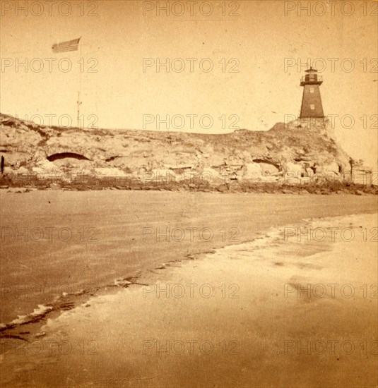 Fort Sumter, south side, Morris Island. Fort Sumter is a Third System masonry sea fort located in Charleston Harbor, South Carolina. The fort is best known as the site upon which the shots that started the American Civil War were fired, at the Battle of Fort Sumter on April 12, 1861. , Vintage photography