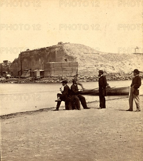 Fort Sumpter (i.e. Sumter) from the bar. Fort Sumter is a Third System masonry sea fort located in Charleston Harbor, South Carolina. The fort is best known as the site upon which the shots that started the American Civil War were fired, at the Battle of Fort Sumter on April 12, 1861. , Vintage photography