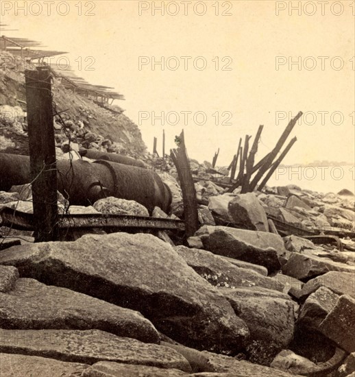 Sea face of Fort Sumpter (i.e. Sumter), shewing (i.e. showing) broken guns &c. Fort Sumter is a Third System masonry sea fort located in Charleston Harbor, South Carolina. The fort is best known as the site upon which the shots that started the American Civil War were fired, at the Battle of Fort Sumter on April 12, 1861. , Vintage photography