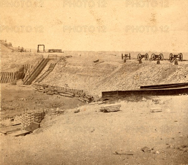 View from the parapet of Fort Sumpter (i.e. Sumter), S.C., with Charleston in the distance. Taken April 14, '65, on the occasion of the raising of the old flag, Vintage photography