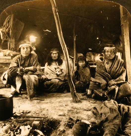 A typical group of Patagonians under their sheepskin tent, a race of South American giants, World's Fair, St. Louis, US, USA, America, Vintage photography