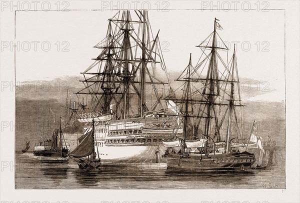 THE ARCTIC EXPEDITION: THE YACHT "PANDORA" LYING UNDER THE STERN OF THE "SERAPIS" IN PORTSMOUTH HARBOUR, UK, 1876