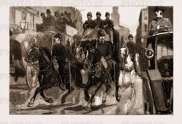 THE DYNAMITE PLOT: THE FENIAN PRISONERS BEING ESCORTED FROM BOW STREET POLICE STATION TO MILLBANK PRISON, UK, 1883