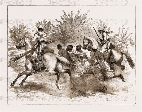 THE REBELLION IN THE SUDAN, 1883: BASHI-BAZOUK SCOUTS RUNNING IN ARAB PRISONERS