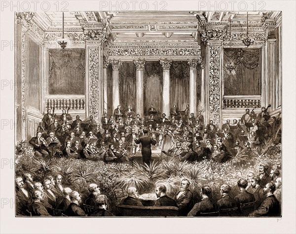 THE PRINCE OF WALES AT THE SMOKING-CONCERT OF THE ROYAL AMATEUR ORCHESTRAL SOCIETY IN THE PRINCE'S HALL, PICCADILLY, LONDON, UK, 1883