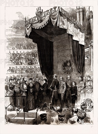 THE OPENING OF THE COLONIAL AND INDIAN EXHIBITION BY THE QUEEN: HER MAJESTY READING THE REPLY TO THE PRINCE OF WALES'S ADDRESS IN THE ALBERT HALL, UK, 1886