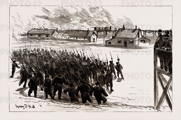 NAVAL SHAM FIGHT AT WHALE ISLAND, PORTSMOUTH, UK, 1886, WITNESSED BY NUMEROUS MEMBERS OF THE HOUSE OF COMMONS AT THE INVITATION OF LORD CHARLES BERESFORD: THE FINAL RUSH