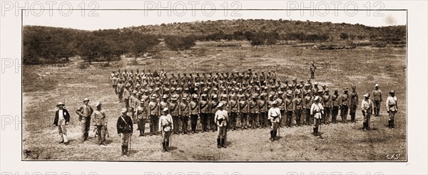 THE LATEST RISING IN SOUTH AFRICA: PARADE OF THE DIAMOND FIELDS HORSE AT POKWANI, 1897