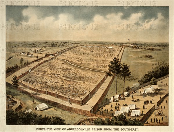 Bird's-eye view of Andersonville Prison from the south-east; c1890.; 1 print : lithograph, color.; Print showing Andersonville Prison, with the vast prison area surrounded by stockade fences and several banks of cannons in the foreground and the distance.