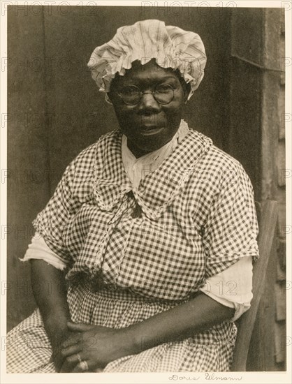 [Black Woman in Cap and Gingham Dress]