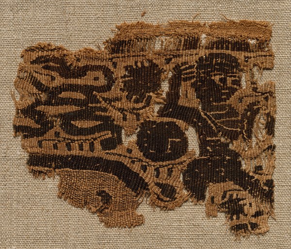 Fragment, Part of an Ornament from a Garment, 500s. Egypt, Byzantine period, 6th century. Tapestry (originally inwoven in tabby ground); linen and wool; overall: 8 x 9.9 cm (3 1/8 x 3 7/8 in.)