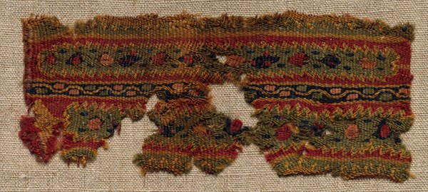 Fragment, Probably Part of an Ornament of a Tunic, 400s - 600s. Egypt, Byzantine period, 5th - 7th century. Tapestry weave: wool; overall: 5.6 x 13.1 cm (2 3/16 x 5 3/16 in.)
