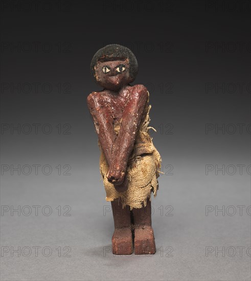 Seated Model Sailor, 2000-1000 BC. Egypt, Middle Kingdom, late Dynasty 11 (2040-1980 BC) to early Dynasty 12 (1980-1951 BC). Painted sycamore fig; average: 11 cm (4 5/16 in.).