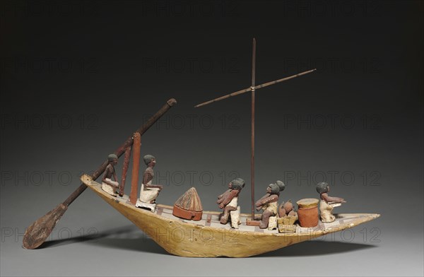 Model Boat, 2040-1648. Egypt, Late Dynasty 11 to Early Dynasty 12. Gessoed and painted sycamore fig; overall: 17.2 cm (6 3/4 in.); average: 10.4 cm (4 1/8 in.).
