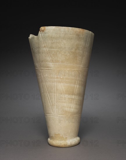 Tall Jar with Rope Patterns, 2647-2454 BC. Egypt, Saqqara, north of the Step Pyramid, tomb 2305, excavations of J. E. Quibell, 1910-1911, Predynastic-Old Kingdom, Dynasty 3, reign of Djoser, to Dynasty 4, reign of Sneferu, 2628-2549 BC. Travertine; diameter: 13.1 cm (5 3/16 in.); overall: 23.7 cm (9 5/16 in.).