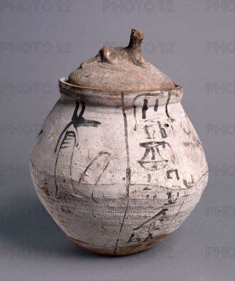 Shawabty Jar with Lid, 1295-1069 BC. Egypt, New Kingdom, Dynasty 19 (1295-1186 BC) - Dynasty 20 (1186-1069 BC). Nile silt ware; diameter: 23.4 cm (9 3/16 in.); diameter of mouth: 11.5 cm (4 1/2 in.); overall: 28.5 cm (11 1/4 in.).