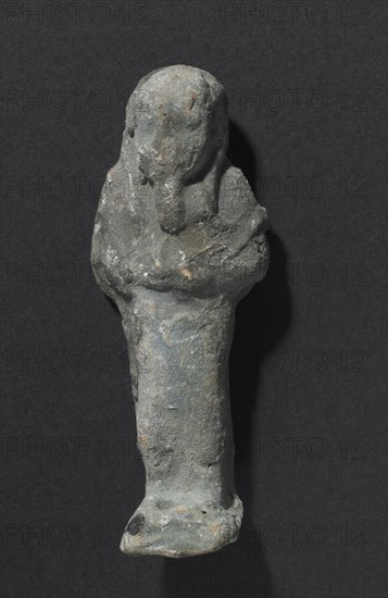 Shawabty of Ditamenpaankh, 715-656 BC. Egypt, Late Period, Dynasty 25. Terracotta; overall: 6.7 x 2.5 x 1.7 cm (2 5/8 x 1 x 11/16 in.).