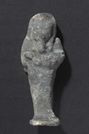 Shawabty of Ditamenpaankh, 715-656 BC. Egypt, Late Period, Dynasty 25. Terracotta; overall: 6.4 x 2.5 x 1.7 cm (2 1/2 x 1 x 11/16 in.).