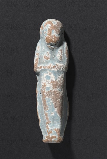 Shawabty of Ditamenpaankh, 715-656 BC. Egypt, Late Period, Dynasty 25. Terracotta; overall: 5.9 x 1.6 x 1.5 cm (2 5/16 x 5/8 x 9/16 in.).