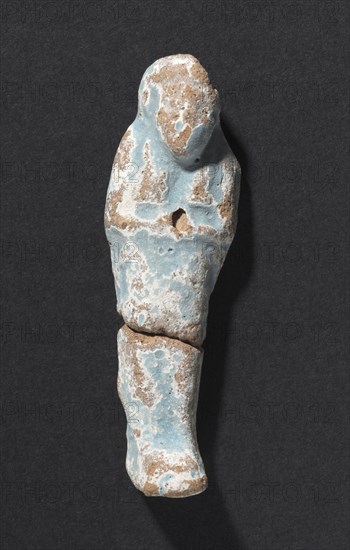Shawabty of Ditamenpaankh, 715-656 BC. Egypt, Late Period, Dynasty 25. Terracotta; overall: 5.7 x 1.7 x 1.2 cm (2 1/4 x 11/16 x 1/2 in.).