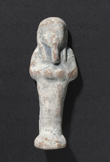 Shawabty of Ditamenpaankh, 715-656 BC. Egypt, Late Period, Dynasty 25. Terracotta; overall: 6.7 x 2.3 x 2 cm (2 5/8 x 7/8 x 13/16 in.).