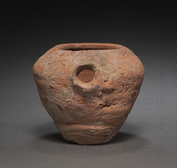 Spouted Jar, 2040-1648 BC. Egypt, Middle Kingdom. Nile silt ware; diameter: 12.7 cm (5 in.); diameter of mouth: 6.8 cm (2 11/16 in.); overall: 10.3 cm (4 1/16 in.).
