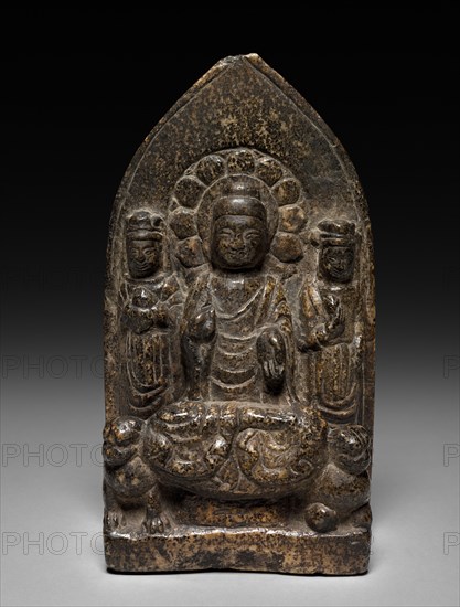 Buddha Triad, 568. China, Eastern Zhou dynasty (771-256 BC). Stone; overall: 21.3 x 11.7 cm (8 3/8 x 4 5/8 in.).