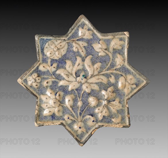 Wall Tile with Lotus Blossom, c. 1300-1350. Iran, probably Sultanabad. Fritware with molded and underglaze-painted design; overall: 20 x 20 cm (7 7/8 x 7 7/8 in.).