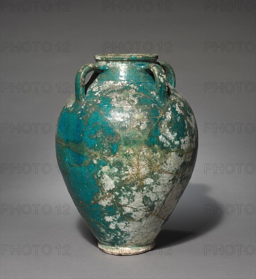 Storage Jar, 13th Century. Syria (Raqqa), Ayyubid Period. Fritware with glaze; diameter of mouth: 16 cm (6 5/16 in.); overall: 48.2 cm (19 in.); diameter of base: 14 cm (5 1/2 in.).