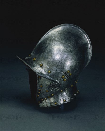 Burgonet with Hinged Cheek Pieces, c. 1560 - 1570. North Italy, 16th century. Steel with brass rivets, roped edges terminating in decorative spiral; fragments of leather liner; overall: 37 x 31.2 x 19.2 cm (14 9/16 x 12 5/16 x 7 9/16 in.).